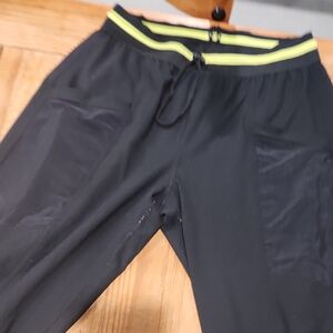 Fabletics Black Leggings with Neon Highlights